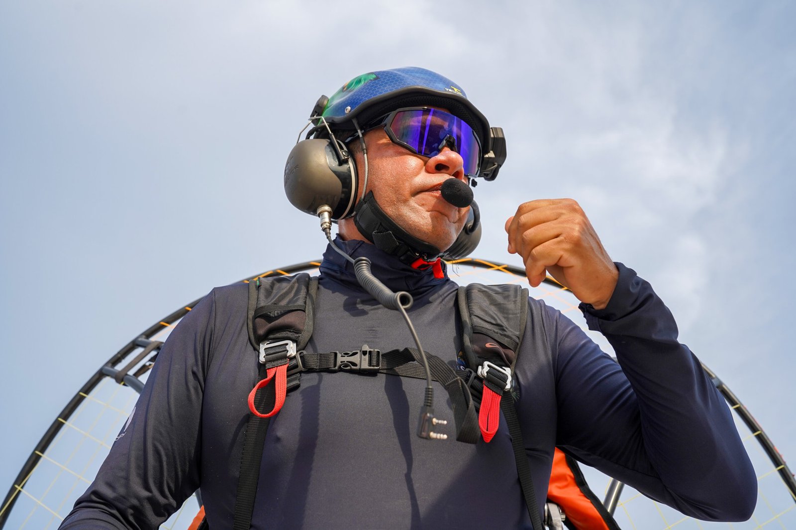 WNTT paramotor pilot flying over open sky